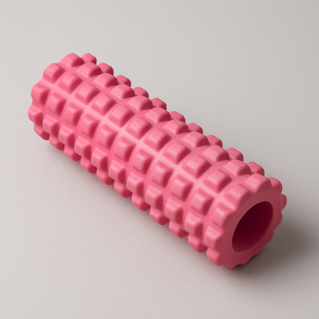 Pink textured foam roller, studio shot