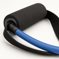Close-up of resistance band handle and tubing