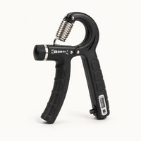 Adjustable hand grip strengthener with digital counter